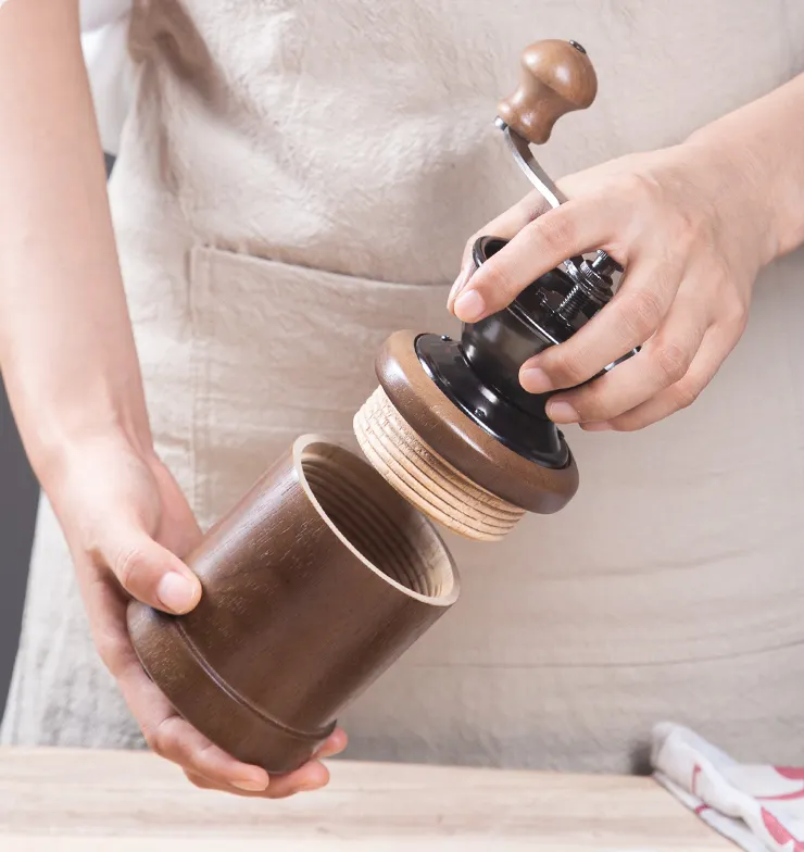 Portable manual wooden coffee grinding customized or purchased on behalf of others